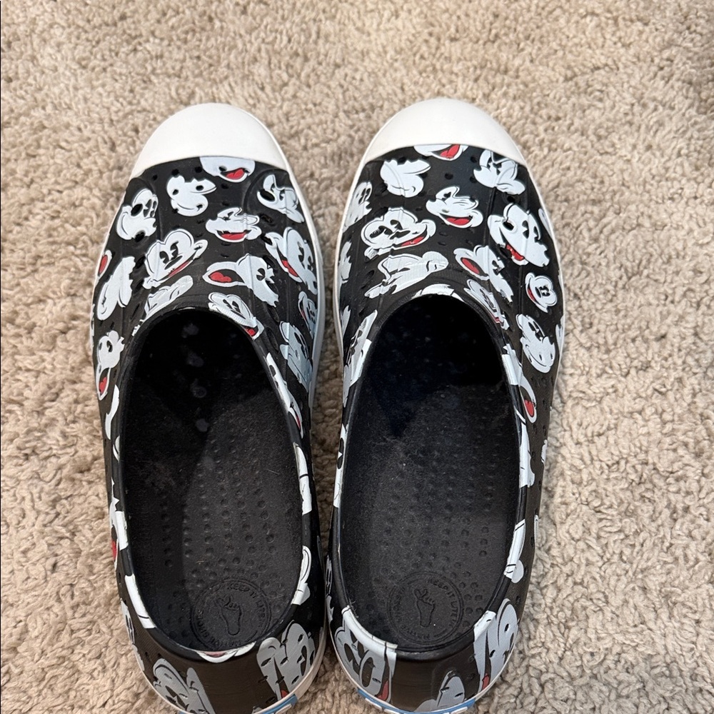 Native Black & White Mickey Pattern Slip-On Sneakers with Red Accents